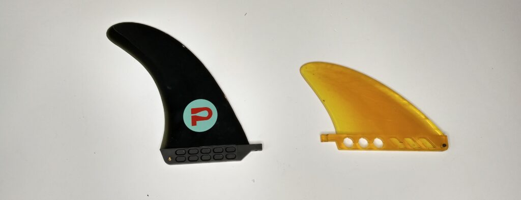 PADL's new and old paddle board rental fins side by side